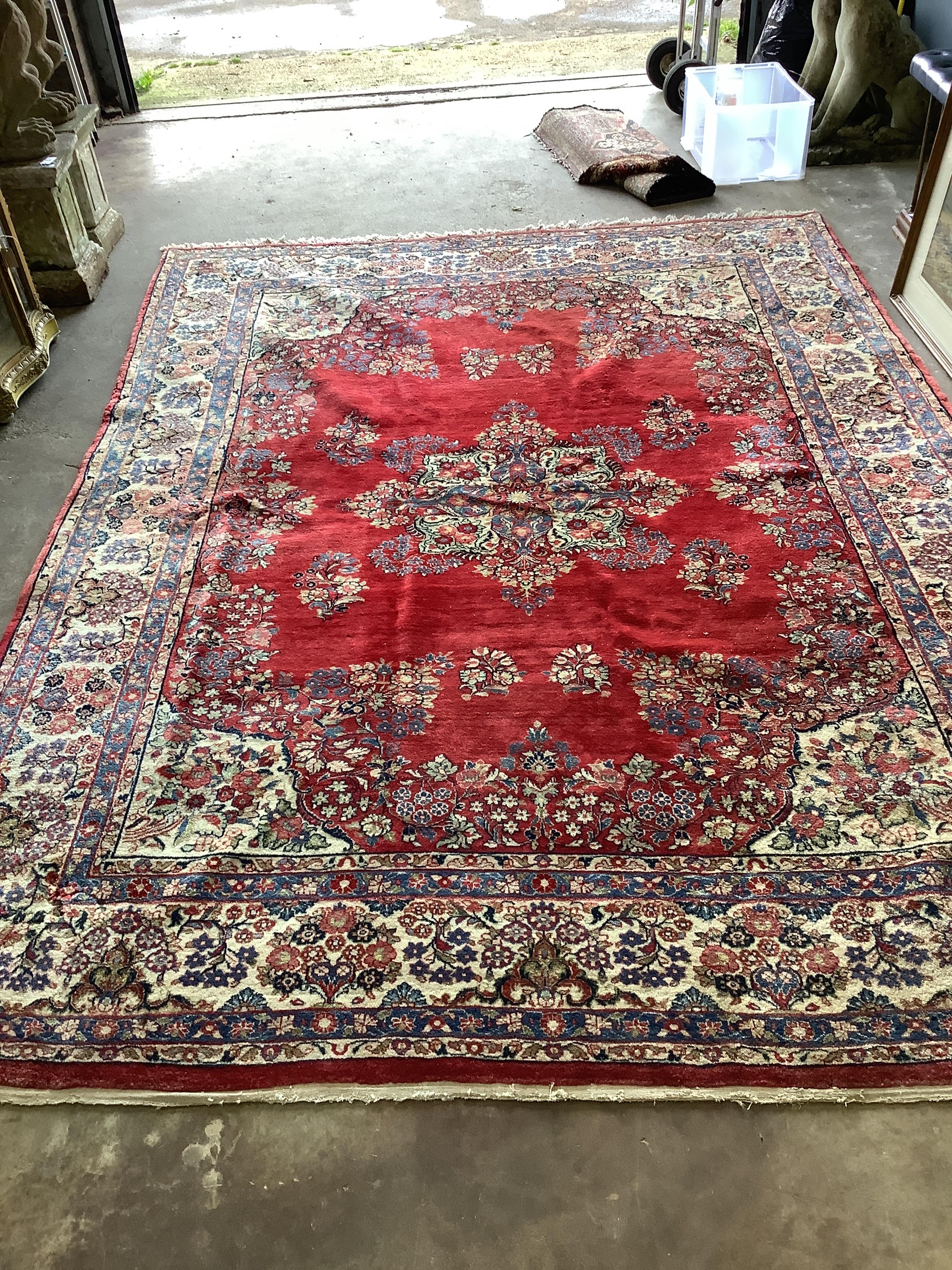 A North West Persian red ground carpet, 360 x 270cm